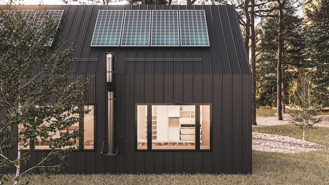 a-wood-building-with-a-glass-roof-o2xy4svoaqk